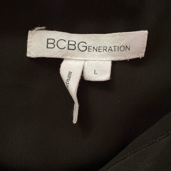 BCBGeneration Black Ruffle Sleeveless Romper - Picture 2 of 7